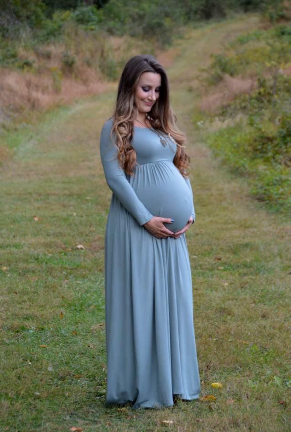 Pregnant woman outside for nature therapy in Baltimore